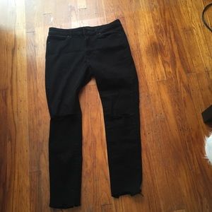 Uniqlo black jean with holes on the knees